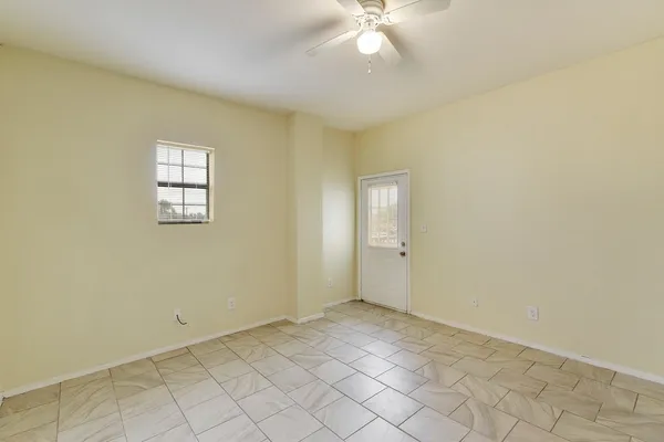 a view of an empty room and window