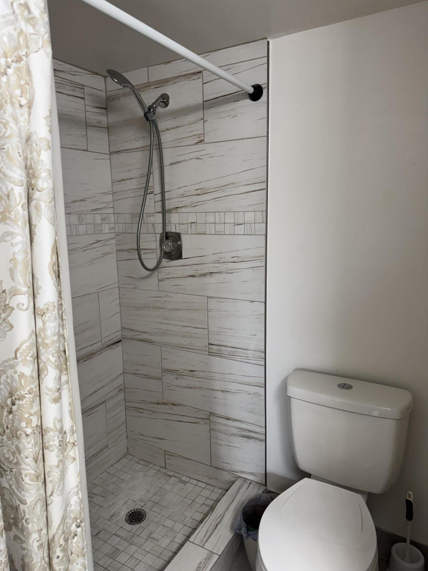2039 Rexford A, Unit C Boca Raton, FL 33434 - Photo 13 of 27 master stepin shower
