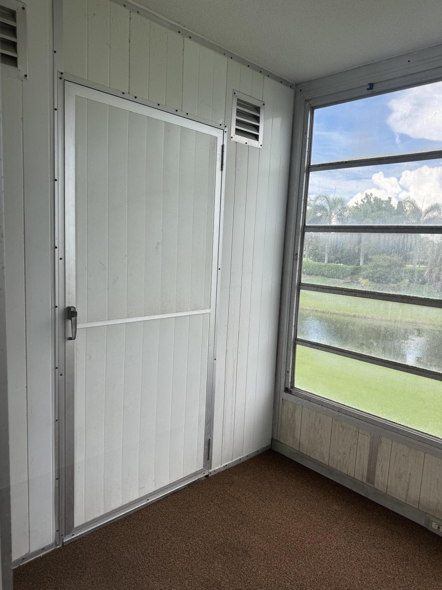 2039 Rexford A, Unit C Boca Raton, FL 33434 - Photo 15 of 27 patio storage closet