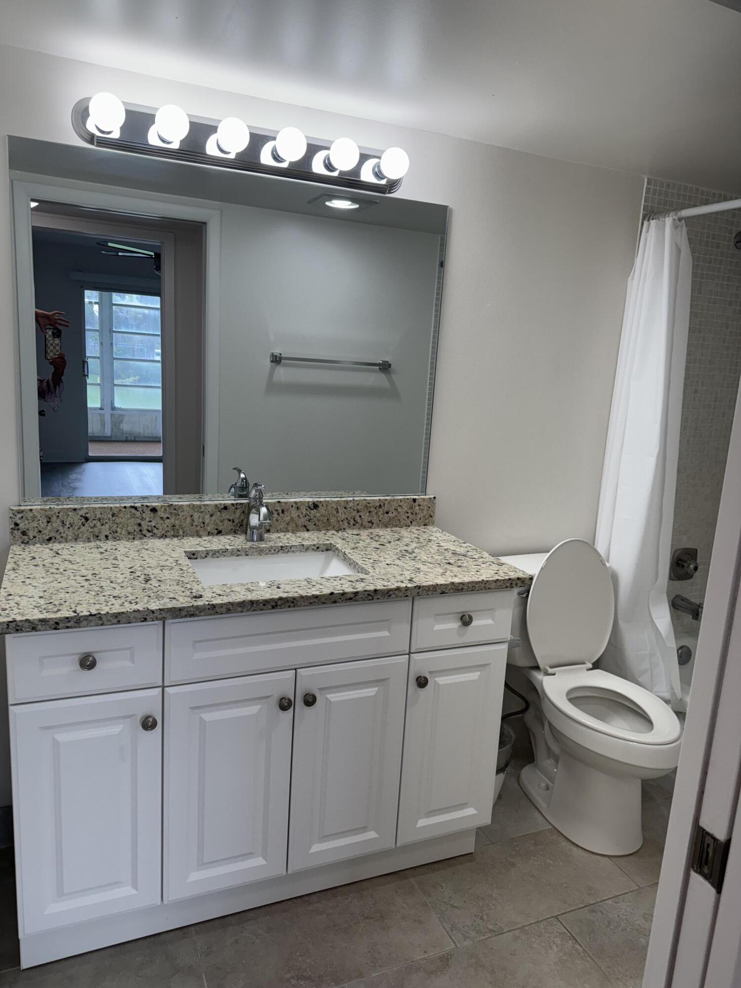 2039 Rexford A, Unit C Boca Raton, FL 33434 - Photo 9 of 27 guest bathroom