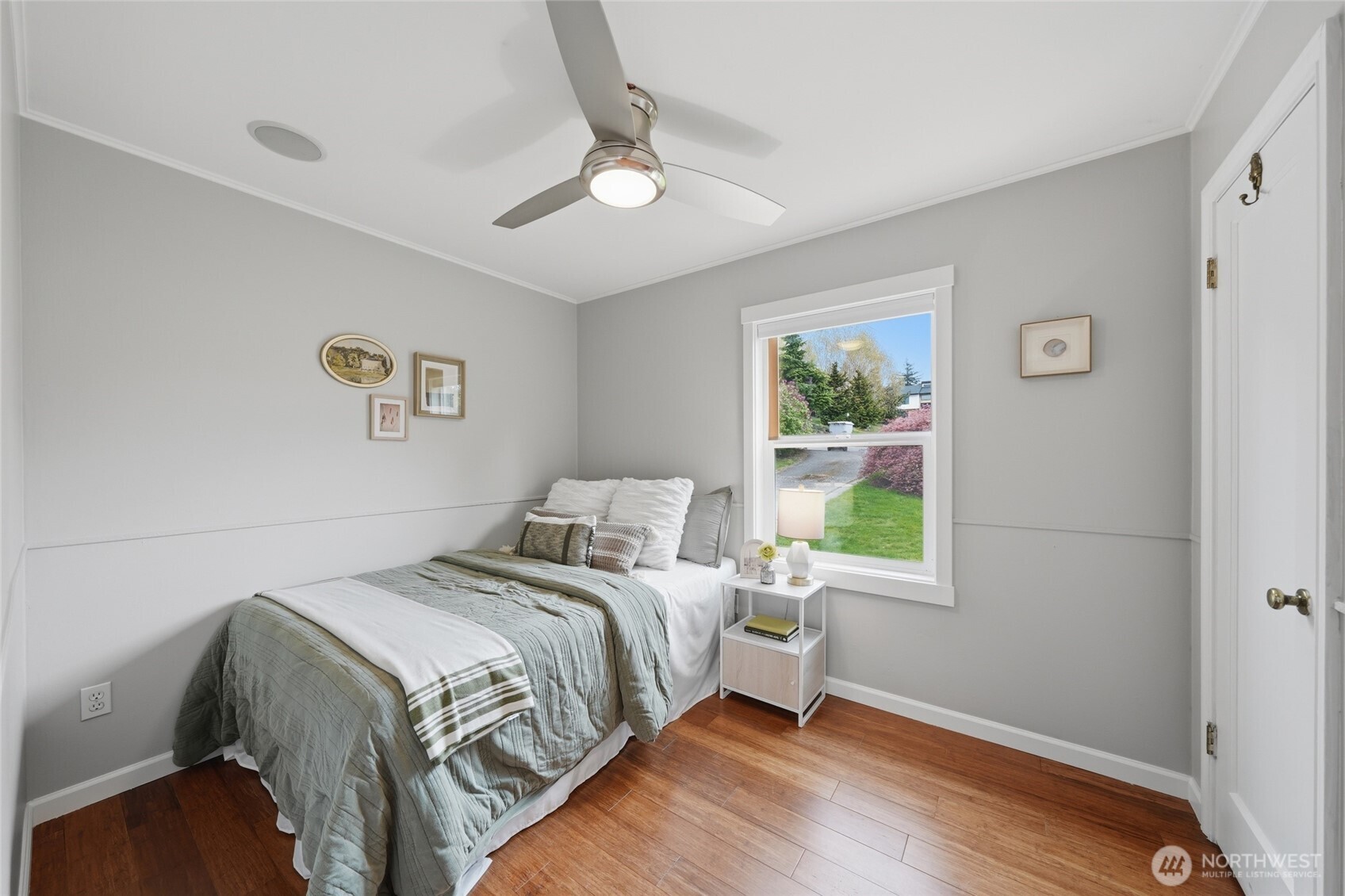 1425 Jones Avenue Northeast Renton, WA 98056 - Photo 12 of 36 a bedroom with a bed and a window