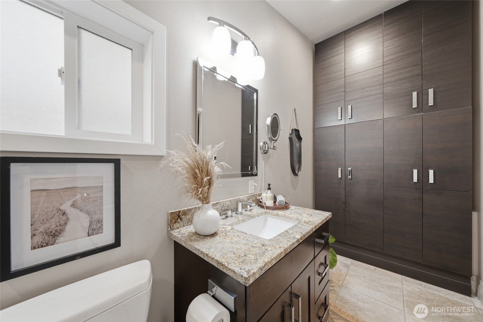 1425 Jones Avenue Northeast Renton, WA 98056 - Photo 19 of 36 a bathroom with a sink vanity and a mirror