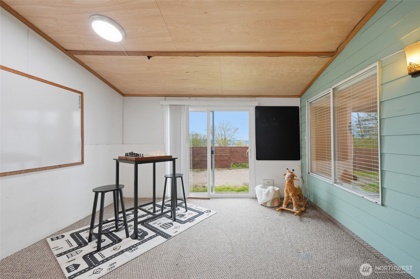 1425 Jones Avenue Northeast Renton, WA 98056 - Photo 21 of 36 a view of a room with gym equipment