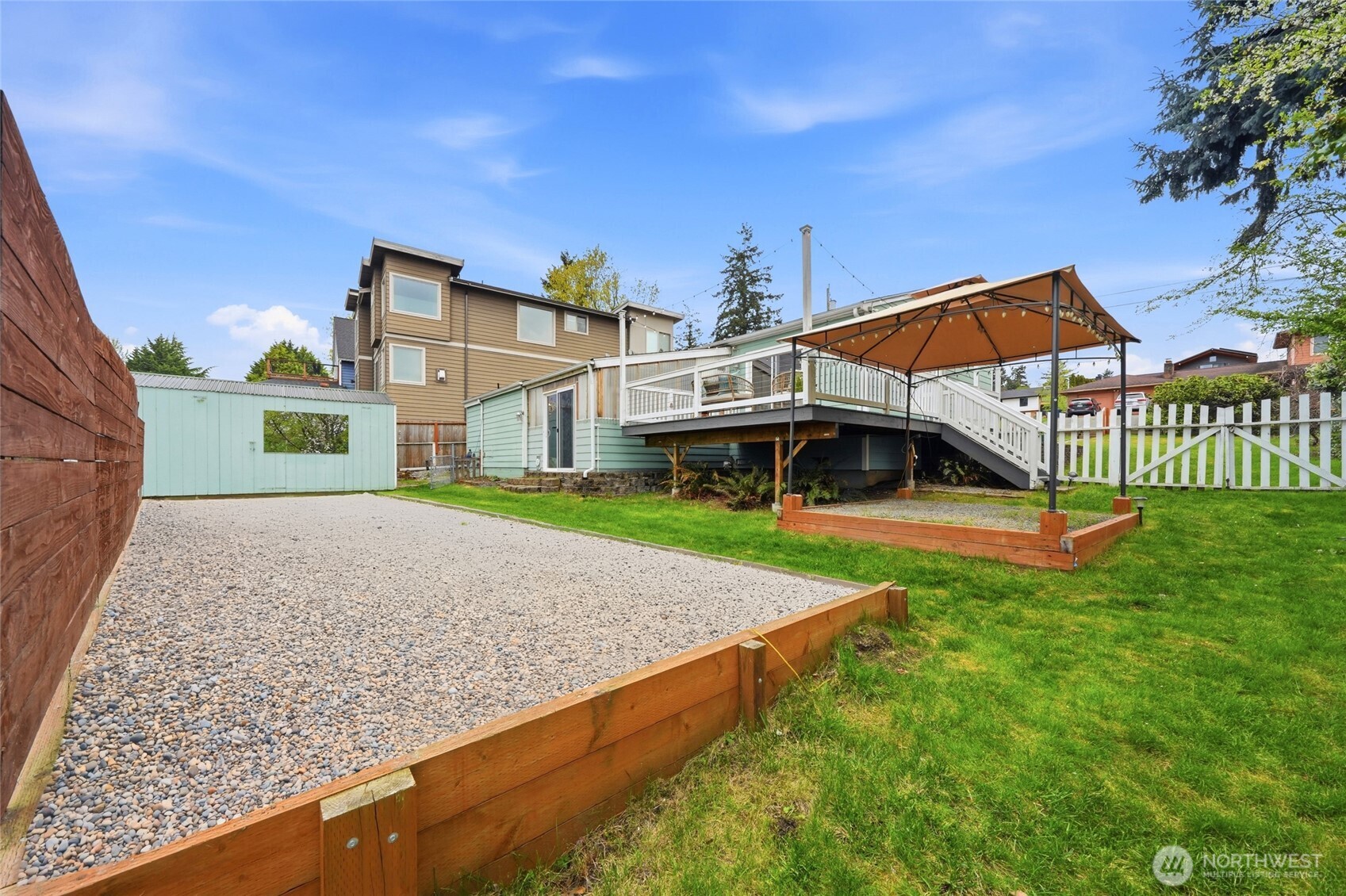 1425 Jones Avenue Northeast Renton, WA 98056 - Photo 24 of 36 a view of a house with a yard