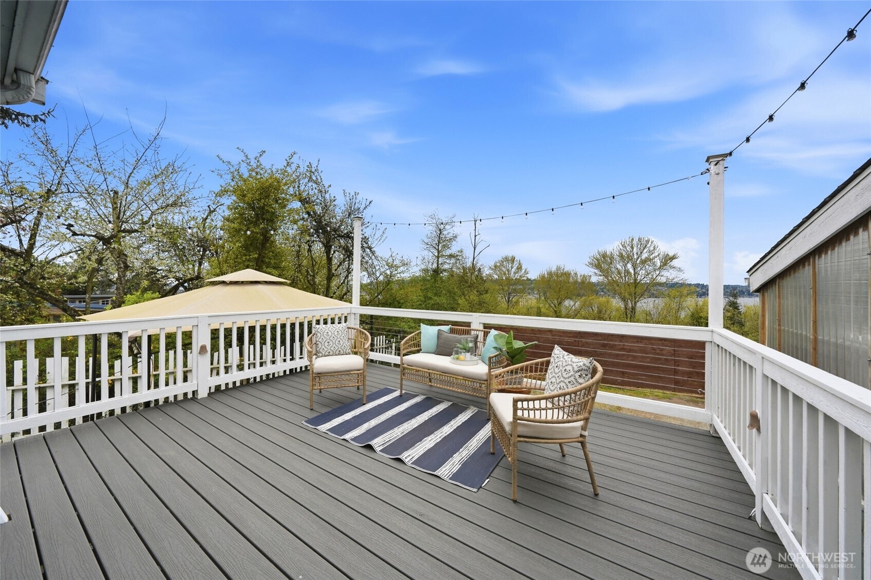 1425 Jones Avenue Northeast Renton, WA 98056 - Photo 27 of 36 a view of balcony with wooden floor and seating space