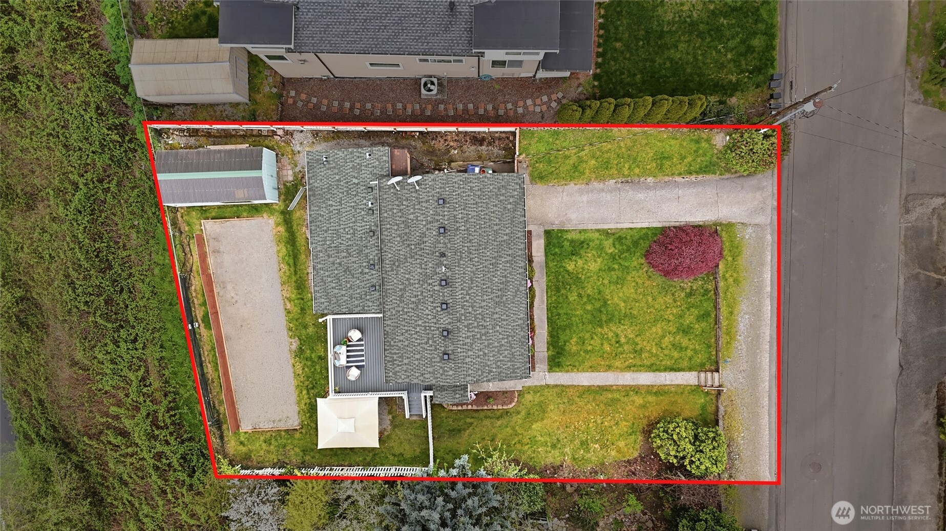 1425 Jones Avenue Northeast Renton, WA 98056 - Photo 28 of 36 an aerial view of a house with a garden