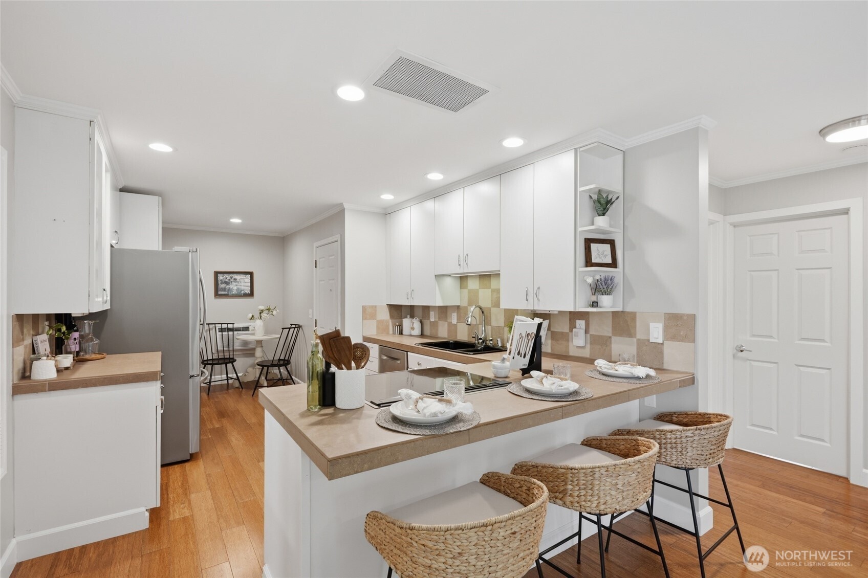 1425 Jones Avenue Northeast Renton, WA 98056 - Photo 7 of 36 a view of a dining room with furniture