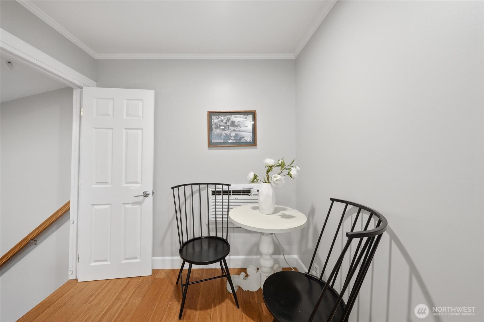 1425 Jones Avenue Northeast Renton, WA 98056 - Photo 10 of 36 a view of a dining room with furniture and wooden floor
