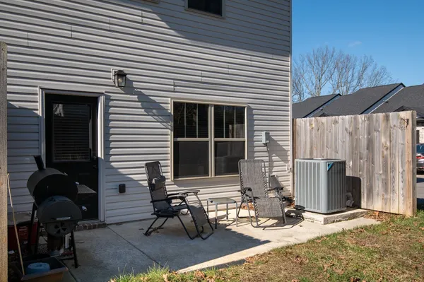 a view of house with outdoor seating space