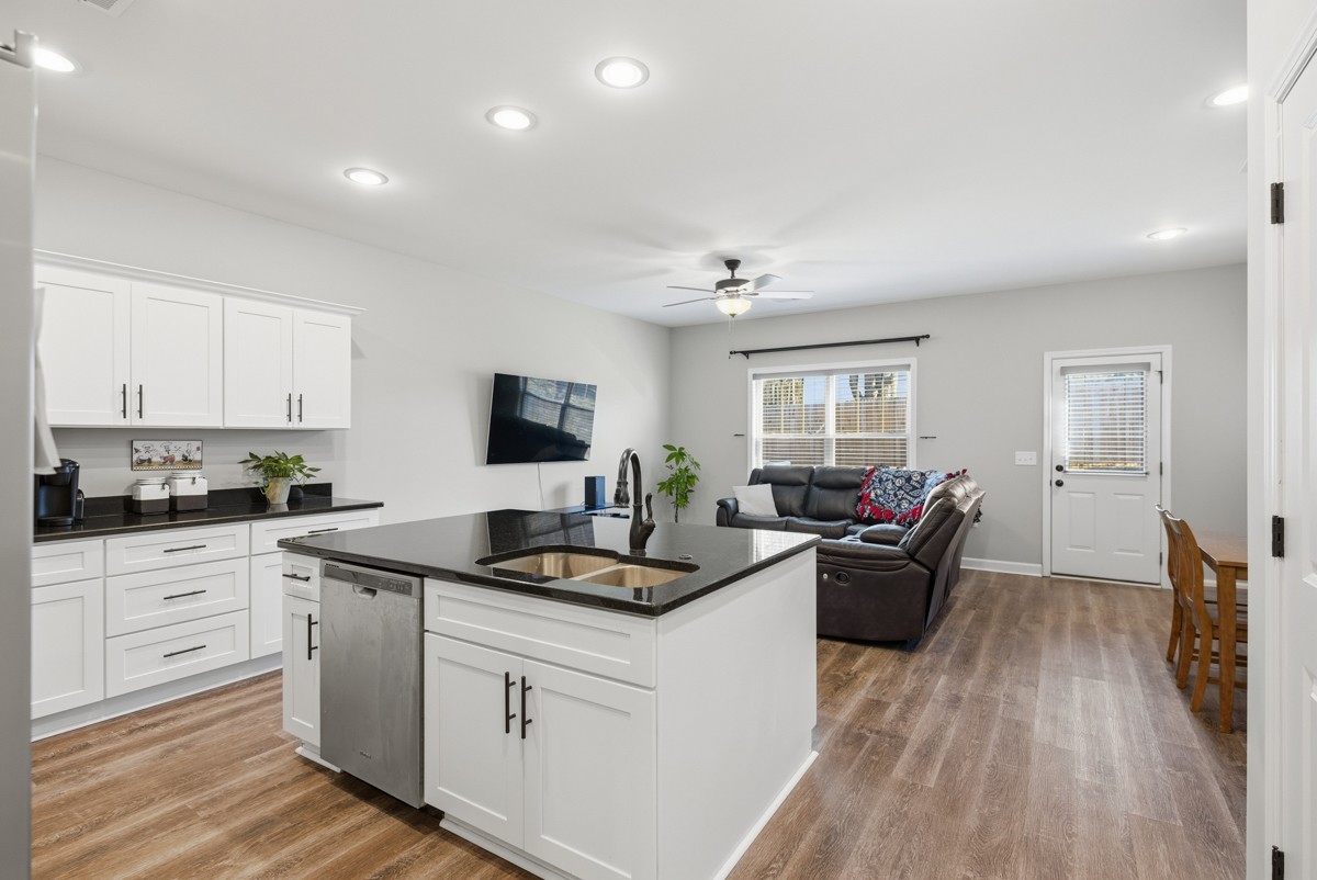 1279 Bluebird Road Lebanon, TN 37087 - Photo 6 of 33 a kitchen with sink stove and cabinets