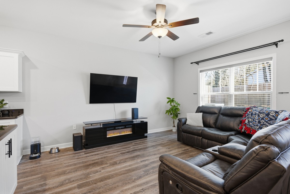 1279 Bluebird Road Lebanon, TN 37087 - Photo 10 of 33 a living room with furniture and a flat screen tv