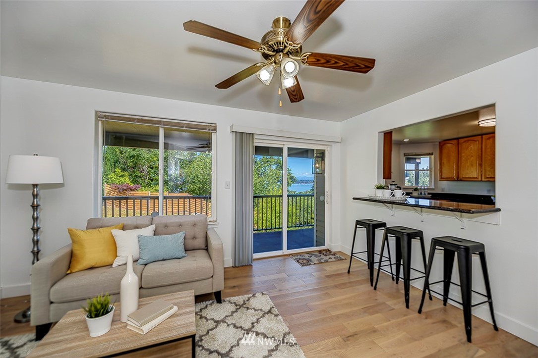 1809 Holbrook Avenue Everett, WA 98203 - Photo 12 of 40 a living room with furniture tv and a window