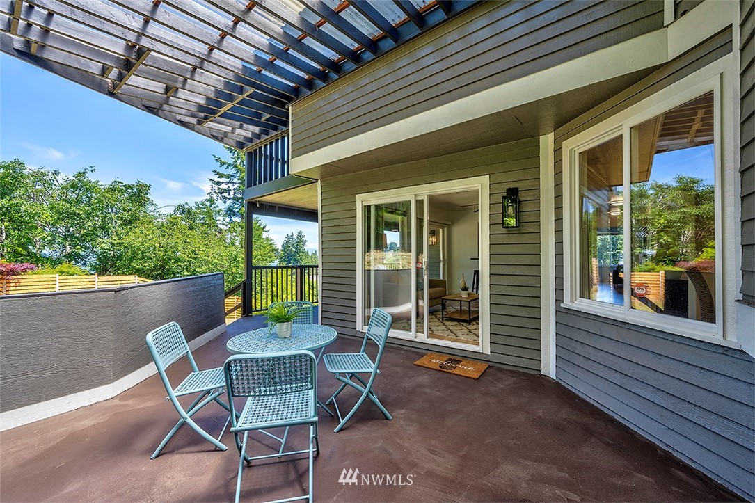 1809 Holbrook Avenue Everett, WA 98203 - Photo 16 of 40 a view of a chair and table in the balcony