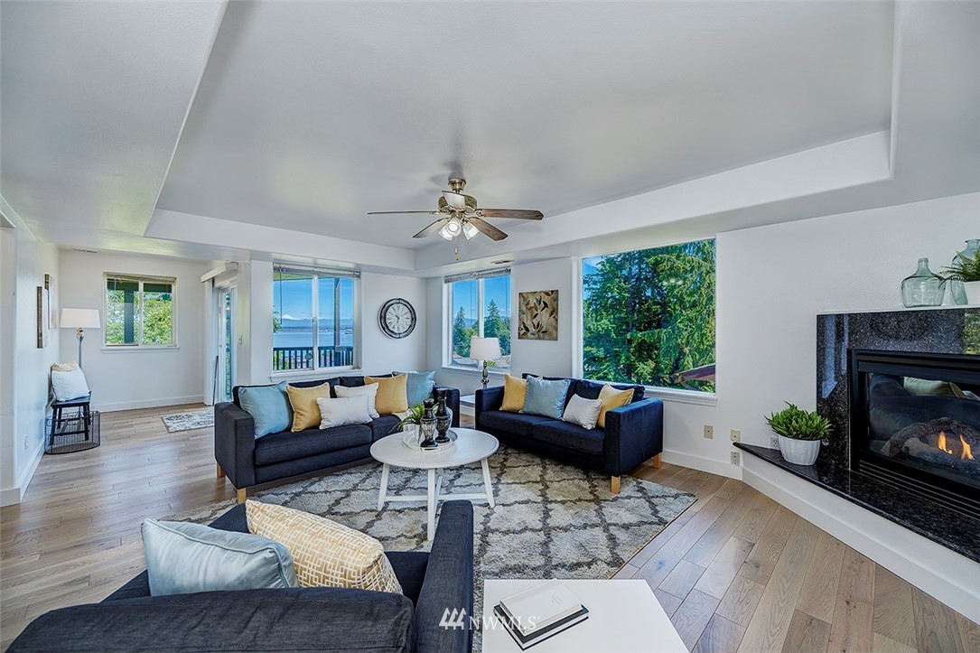 1809 Holbrook Avenue Everett, WA 98203 - Photo 18 of 40 a living room with furniture a fireplace and a large window