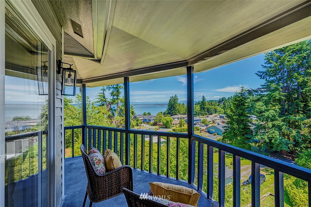 1809 Holbrook Avenue Everett, WA 98203 - Photo 23 of 40 a view of a porch with furniture and wooden deck