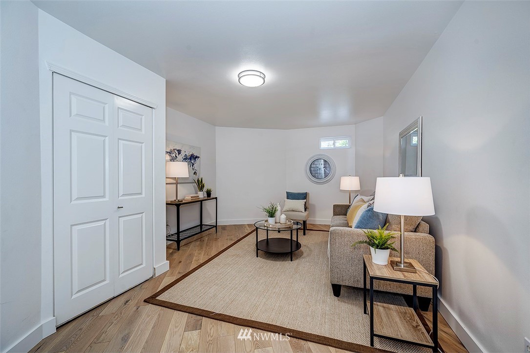 1809 Holbrook Avenue Everett, WA 98203 - Photo 28 of 40 a living room with furniture and a wooden floor