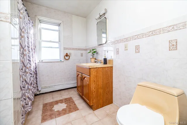 a utility room with a sink a washer and dryer