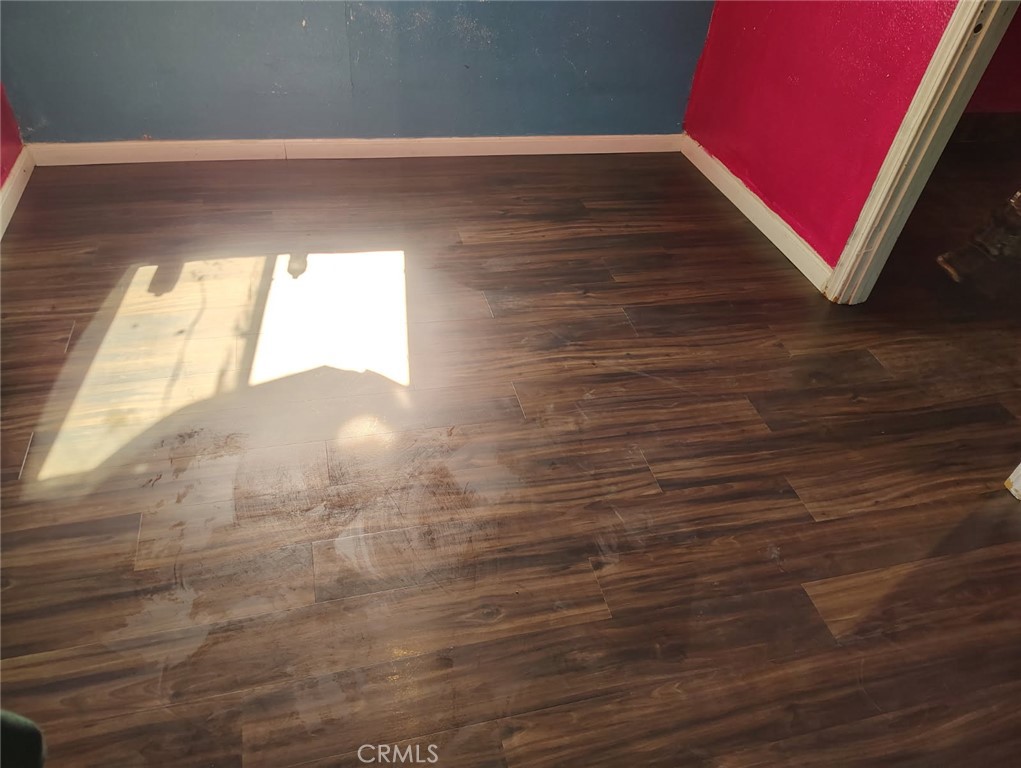 809 South B Street Madera, CA 93638 - Photo 11 of 20 a view of wooden floor