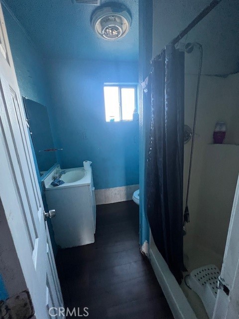 809 South B Street Madera, CA 93638 - Photo 17 of 20 a bathroom with a toilet and a sink