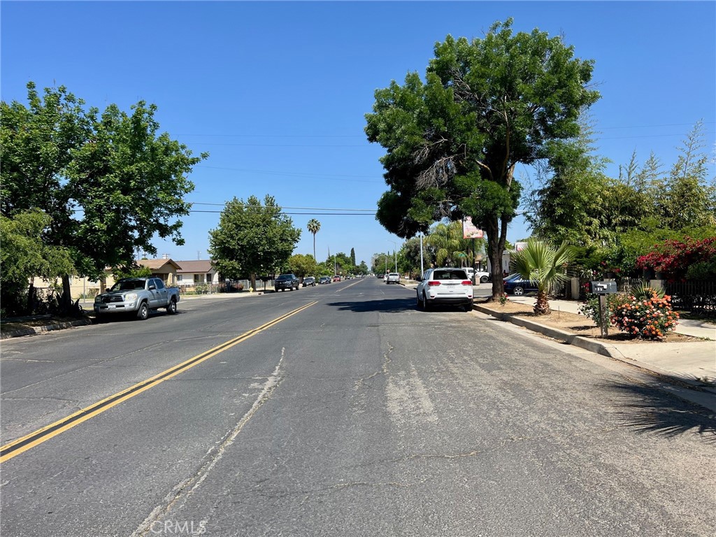 809 South B Street Madera, CA 93638 - Photo 18 of 20 a view of a street with a cars park