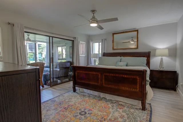 a view of a swimming pool with an outdoor seating