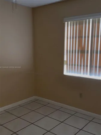 a view of a small space with window