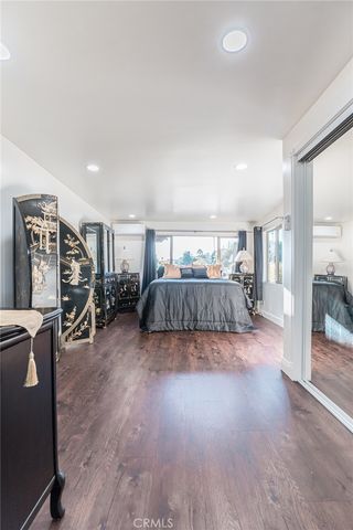 a view of a livingroom with furniture and storage area