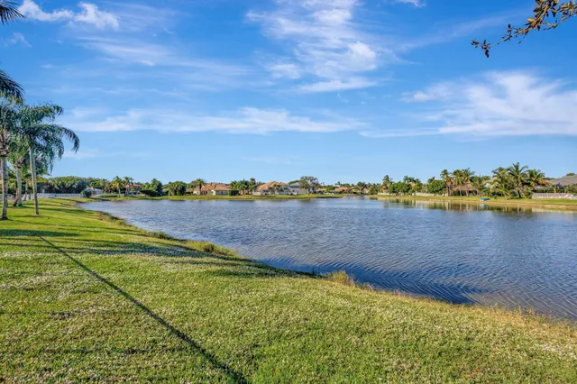 an aerial view of a pool patio and mountain view
