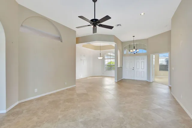 a view of a big room with windows and cabinet