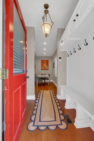 a room with furniture and wooden floor