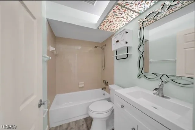 a car parked in front of a house