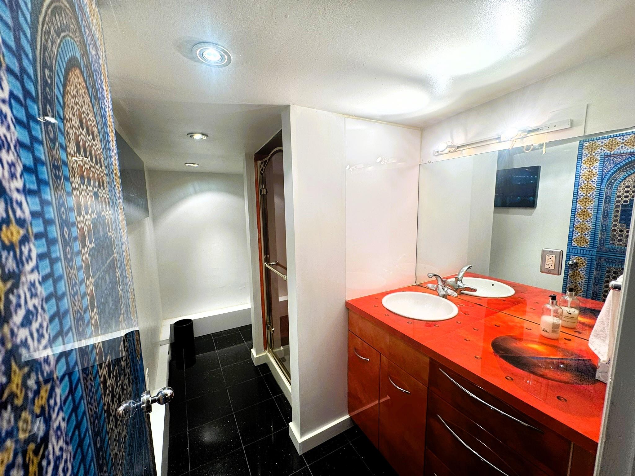 1202 Jackson Corners Road Red Hook, NY 12571 - Photo 15 of 50 a bathroom with sink mirror and shower