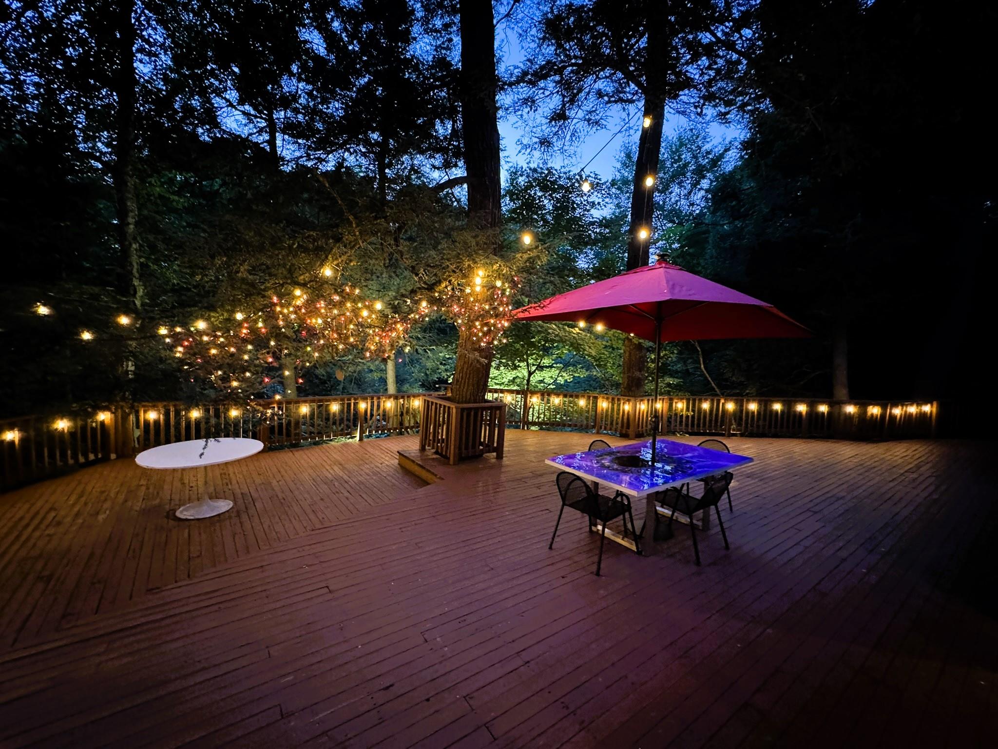 1202 Jackson Corners Road Red Hook, NY 12571 - Photo 33 of 50 a view of a patio with chairs and umbrellas