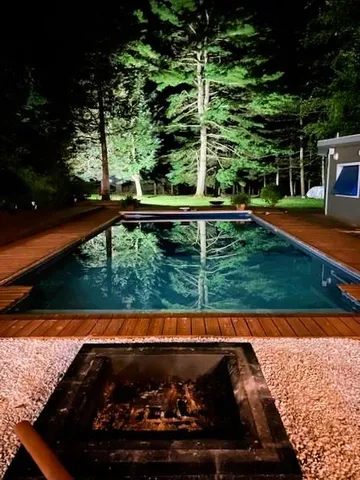 a view of swimming pool from a balcony