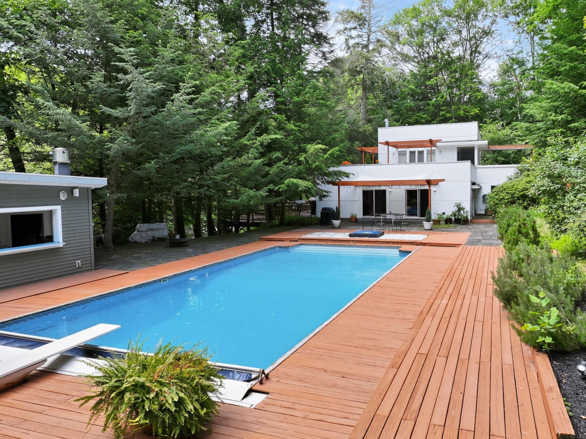 1202 Jackson Corners Road Red Hook, NY 12571 - Photo 37 of 50 a swimming pool with outdoor seating and yard