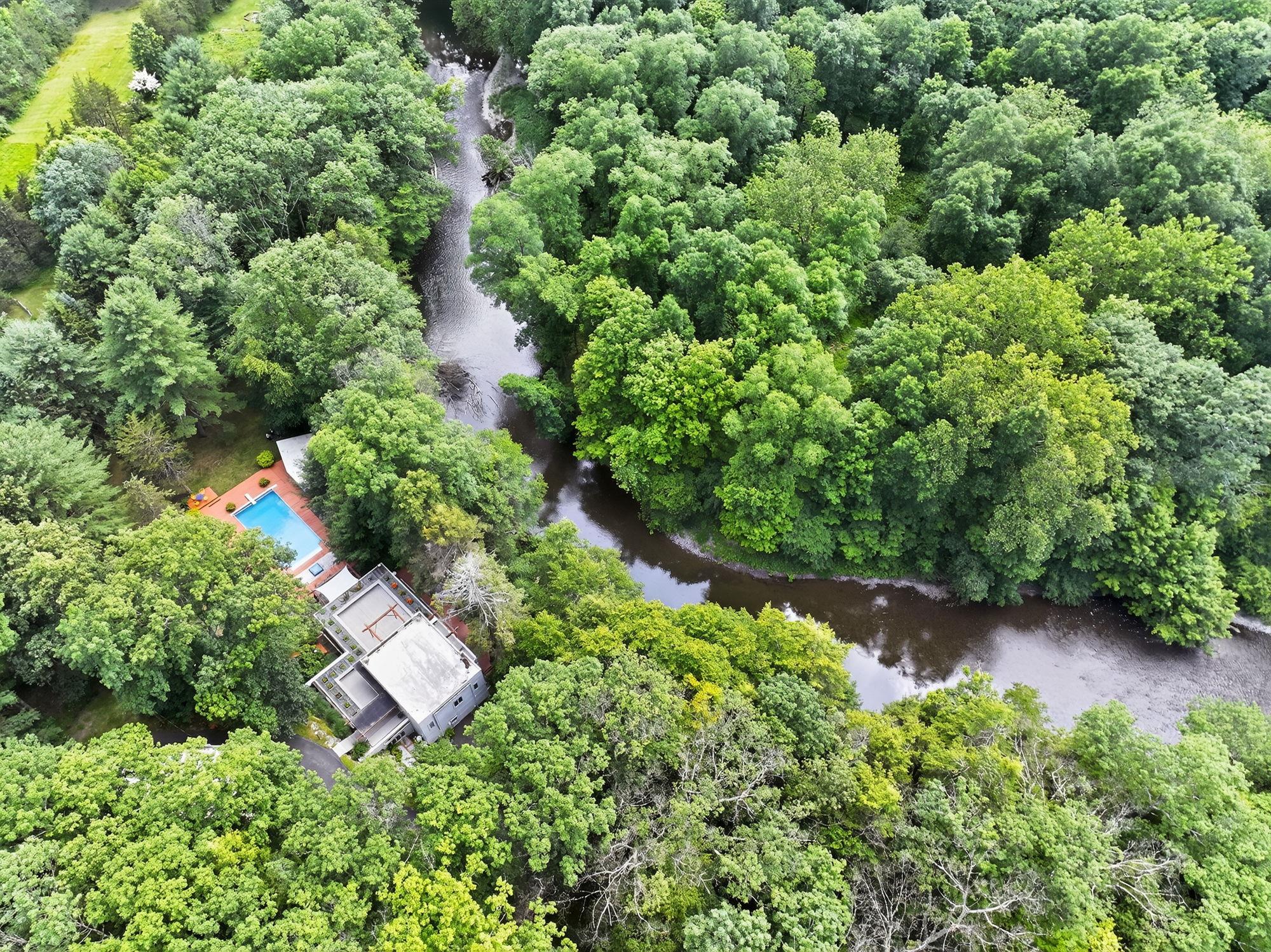 1202 Jackson Corners Road Red Hook, NY 12571 - Photo 42 of 50 an aerial view of residential house with outdoor space and trees all around