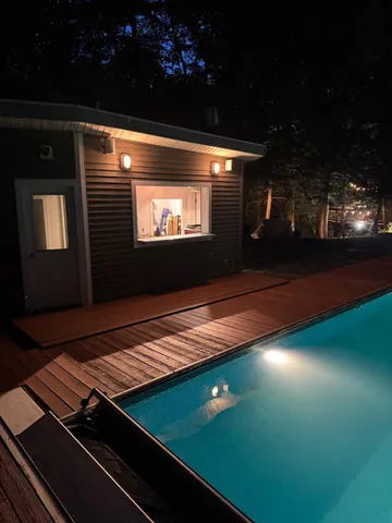 a view of a projector and a yard