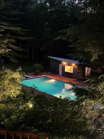 a swimming pool with yard