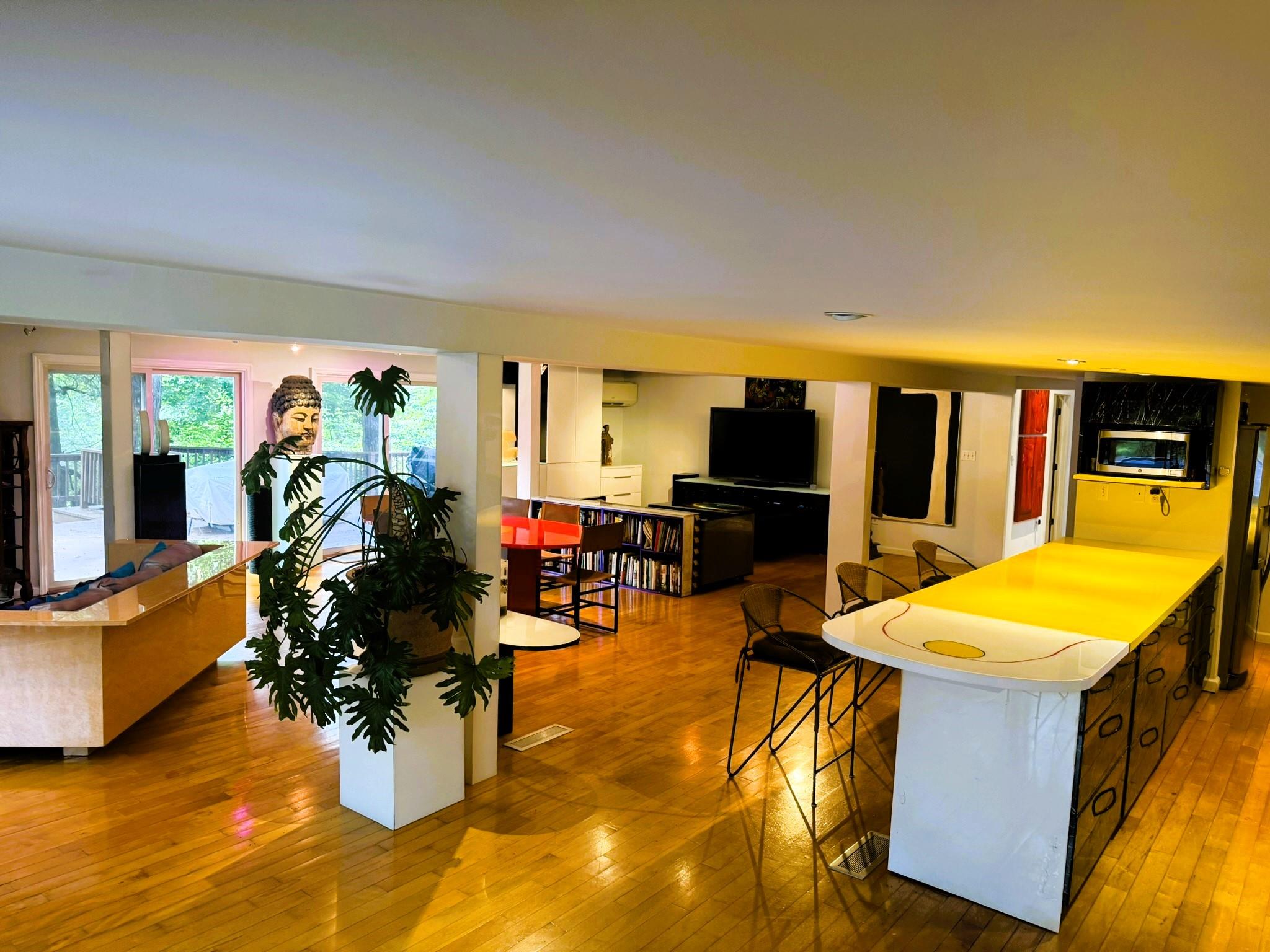 1202 Jackson Corners Road Red Hook, NY 12571 - Photo 6 of 50 a living room filled with furniture and kitchen view