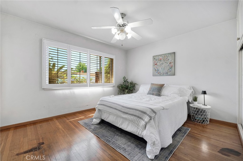 630 Uclan Drive Burbank, CA 91504 - Photo 19 of 41 a spacious bedroom with a bed and a window