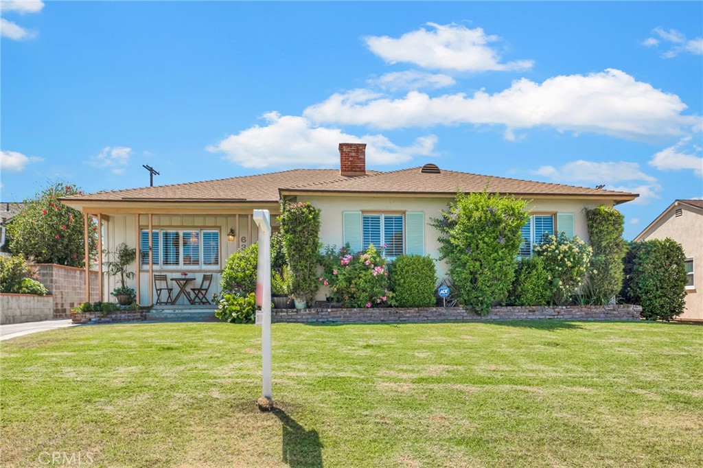 630 Uclan Drive Burbank, CA 91504 - Photo 26 of 41 a front view of a house with a yard