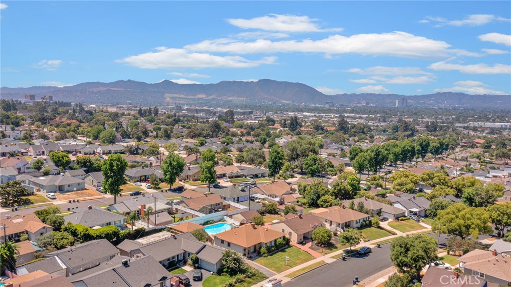 630 Uclan Drive Burbank, CA 91504 - Photo 34 of 41 an aerial view of residential house with parking space and mountain view in back
