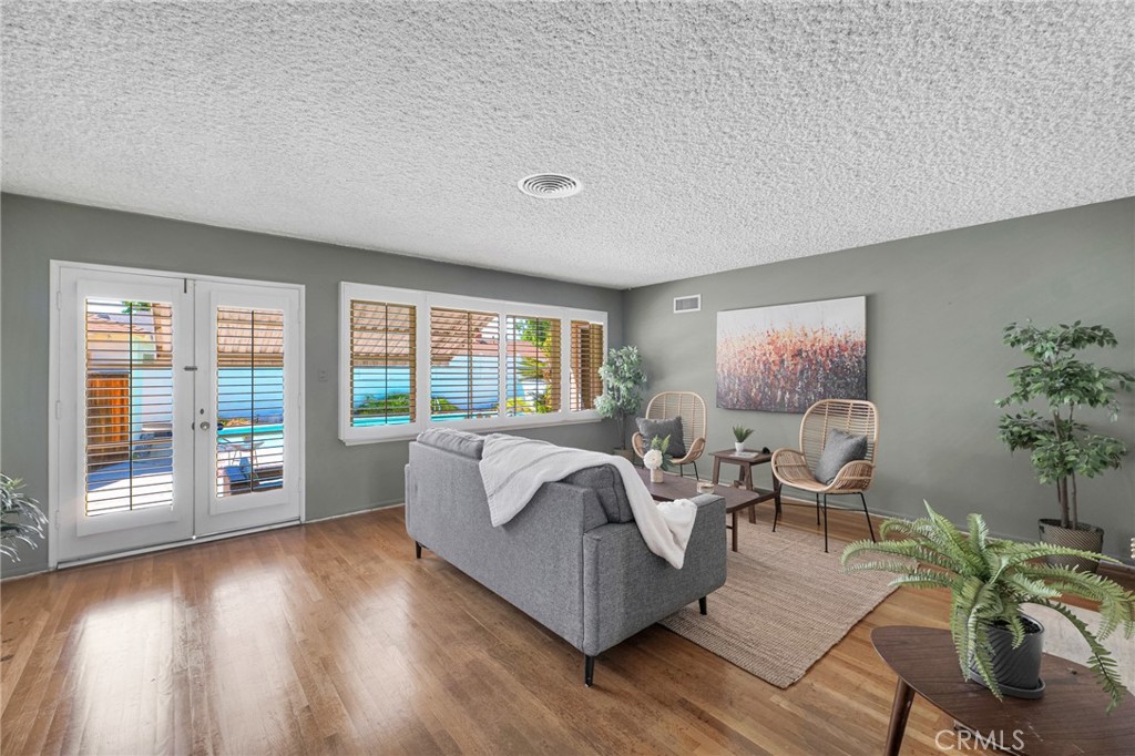 630 Uclan Drive Burbank, CA 91504 - Photo 4 of 41 a living room with furniture and a large window