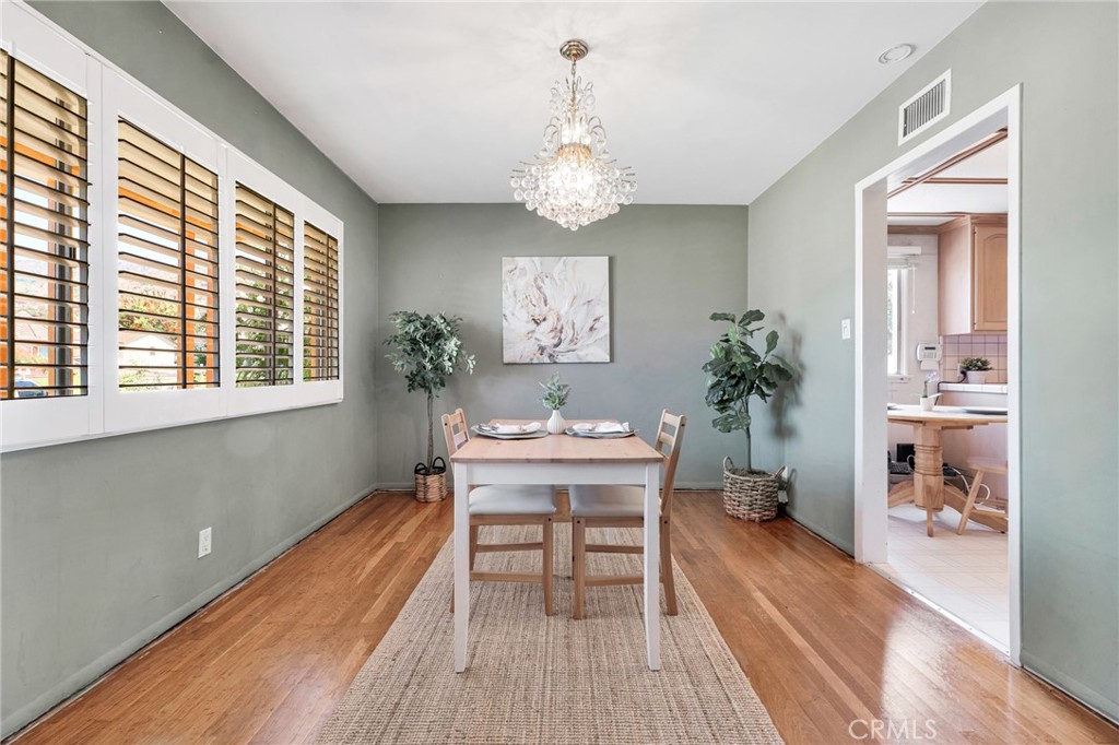 630 Uclan Drive Burbank, CA 91504 - Photo 10 of 41 a view of a dining room with furniture window and wooden floor