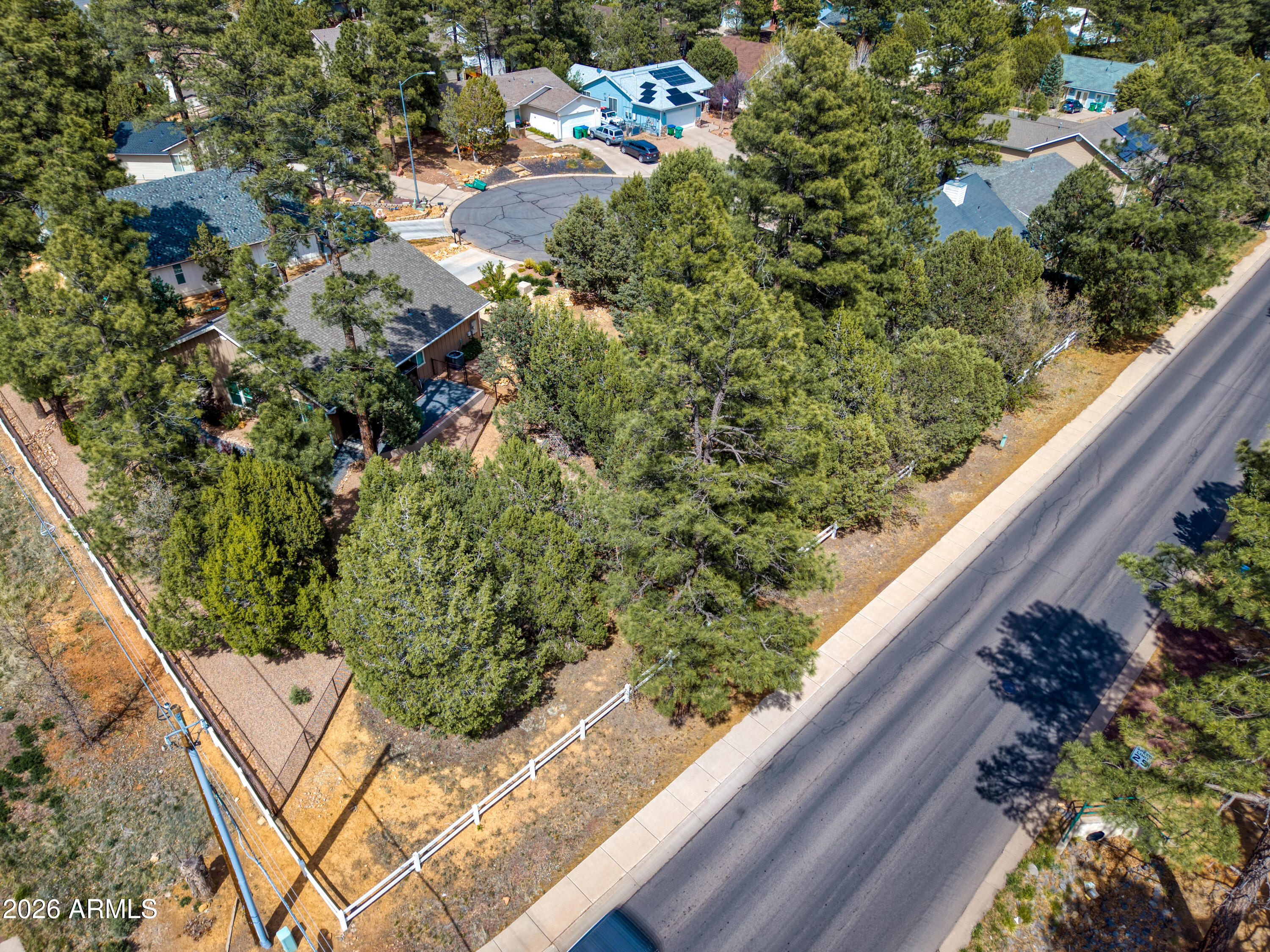 1541 West Huning, Unit 4 Show Low, AZ 85901 - Photo 4 of 7 a view of a garden from a balcony