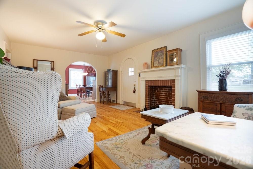 124 Rumple Street Troutman, NC 28166 - Photo 11 of 42 a bed room with a bed and a chandelier