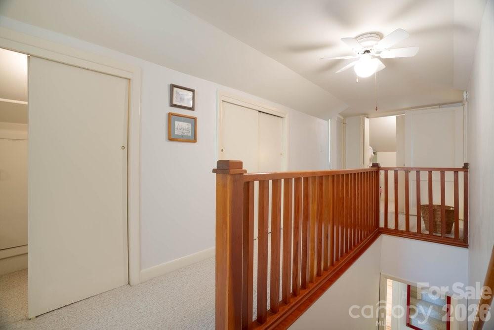 124 Rumple Street Troutman, NC 28166 - Photo 27 of 42 a view of a hallway with windows