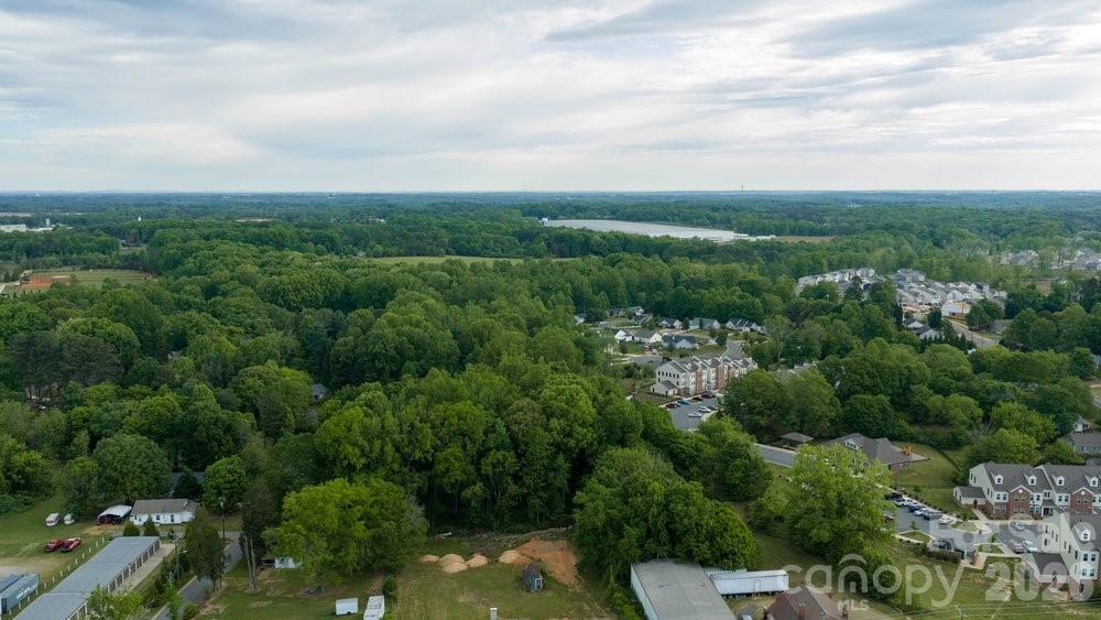 124 Rumple Street Troutman, NC 28166 - Photo 42 of 42 an aerial view of a house with mountain view