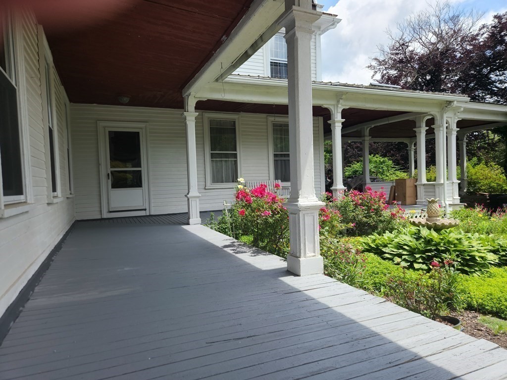 11 Ramshorn Road Dudley, MA 01571 - Photo 3 of 42 front view of the house with potted plants