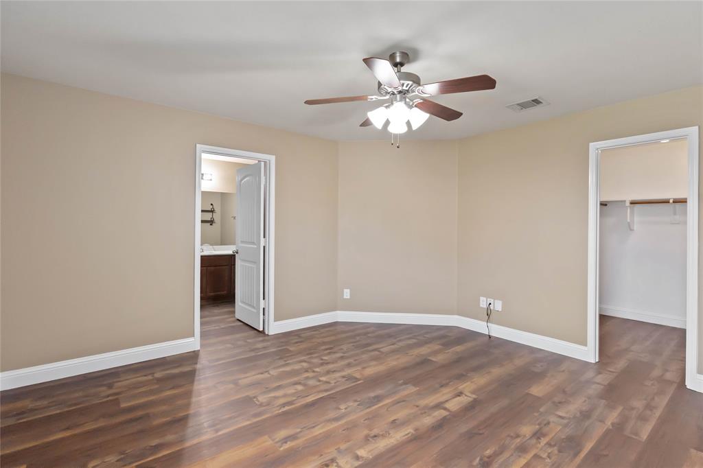 1450 Arabella Avenue Forney, TX 75126 - Photo 18 of 40 a view of an empty room with wooden floor